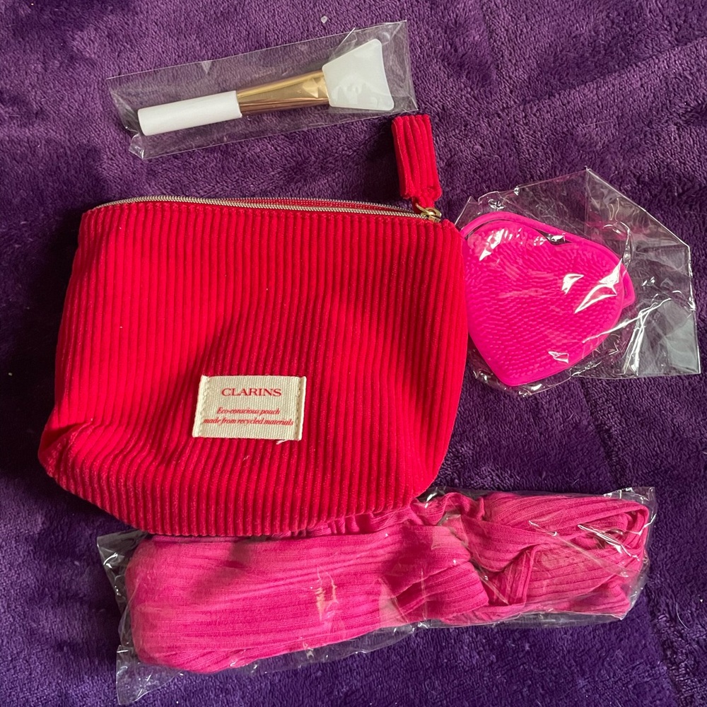 Clarins Vibrant Pink Cosmetic bag with Pink Accessories